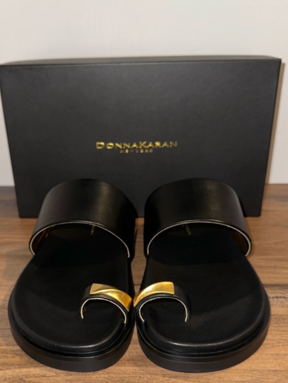 Donna Karan Black & Gold Leather Slide Sandals for women $150
